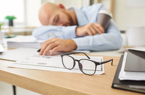Man falling asleep during the day